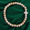 Bracelet sur élastique grains bois Ø 6 mm croix turquoise synthétique