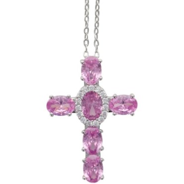 Collier avec chaine et croix H. 3 cm en laiton de couleur argentée. L 40 cm. Existe de différentes couleurs.