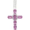 Collier avec chaine et croix H. 3 cm en laiton de couleur argentée. L 40 cm. Existe de différentes couleurs.