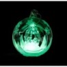 Boule de Noël en verre avec scène de nativité et lumière LED tournante. Ø 10 cm. Effet lumineux changeant.