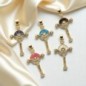 Croix de cou en laiton couleur doré avec pierres oz H. 3.2 cm LOT DE 5