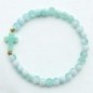 Bracelet élastique, perles en verre Ø 6 mm avec croix. Lot de 6 assortis.