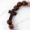 Bracelet élastique homme, perles en bois Ø 1 cm avec croix.