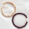Bracelet sur élastique grains bois Ø 6 mm croix turquoise synthétique