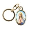 Porte-cles en metal couleur doree H. 3,8 cm avec resine couleur des saints.