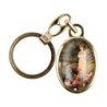 Porte-cles en metal couleur doree H. 3,8 cm avec resine couleur des saints.