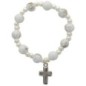 Bracelet dizainier sur élastique pour enfant grains en plastique marbre de différentes couleurs..
