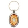 Porte-clés en métal de couleur argenté de forme ovale H. 4.3 cm. Livré en boite cadeaux. Existe avec différents Saints.