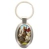 Porte-clés en métal de couleur argenté de forme ovale H. 4.3 cm. Livré en boite cadeaux. Existe avec différents Saints.