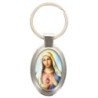 Porte-clés en métal de couleur argenté de forme ovale H. 4.3 cm. Livré en boite cadeaux. Existe avec différents Saints.