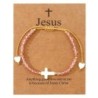 Bracelet sur corde réglable grains de forme cylindrique avec croix et coeur en coquille naturelle.
