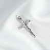 Croix avec Christ en argent 925 °/°° H. 2 cm. (0.89 g) Livré en boite