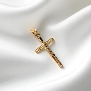 Croix avec Christ en plaque or H. 2 cm. Livré en boite