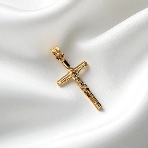 Croix avec Christ en plaque or H. 2 cm. Livré en boite