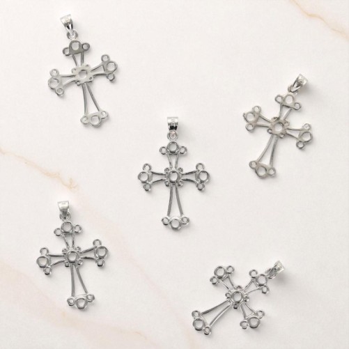 Croix chaldéenne en argent 925 °/°° H 2 cm (1 g) Livré en boite