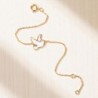 Bracelet en plaqué or avec colombe.