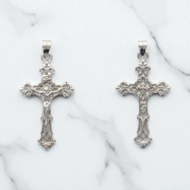 Croix forme baroque avec Christ en argent 925°/°° H 2.6 cm (2.2 g) Livré en boite
