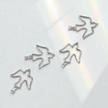 Pendentif colombe ajouré en argent 925 °/°° H. 2 cm. (1.08 g) Livré en boite