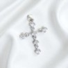 Croix en argent 925 °/°° avec OZ H. 2.1 cm. (1.10 g) Livré en boite