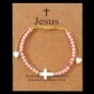 Bracelet sur corde réglable grains de forme cylindrique avec croix et coeur en coquille naturelle.