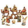 Crèche en résine 11 personnages, H. 7 cm. Livrée en boite présentoir