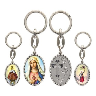 Porte-clés en aluminium de couleur argenté hauteur 3,8 cm, avec résine. Disponible avec plusieurs saints au choix.