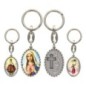 Porte-clés en aluminium de couleur argenté hauteur 3,8 cm, avec résine. Disponible avec plusieurs saints au choix.