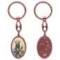 Porte-clés en aluminium de couleur cuivrée, hauteur 3,8 cm, avec résine. Disponible avec plusieurs saints au choix.
