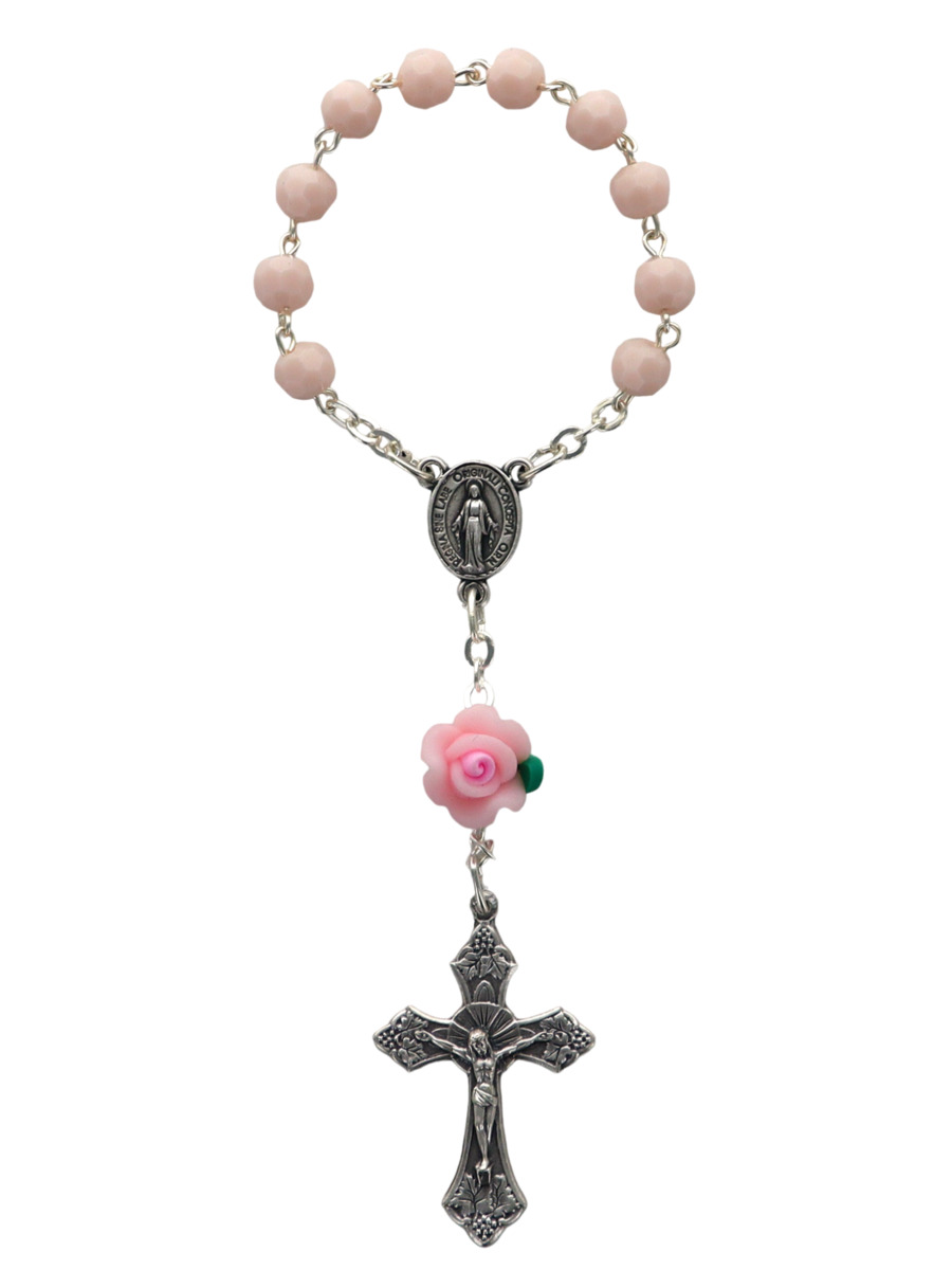 Dizainier sur chaine grains Ø 5 mm et rose, croix métal avec Christ. Disponible en différentes couleurs.