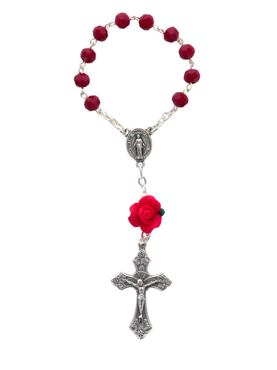 Dizainier sur chaine grains Ø 5 mm et rose, croix métal avec Christ. Disponible en différentes couleurs.